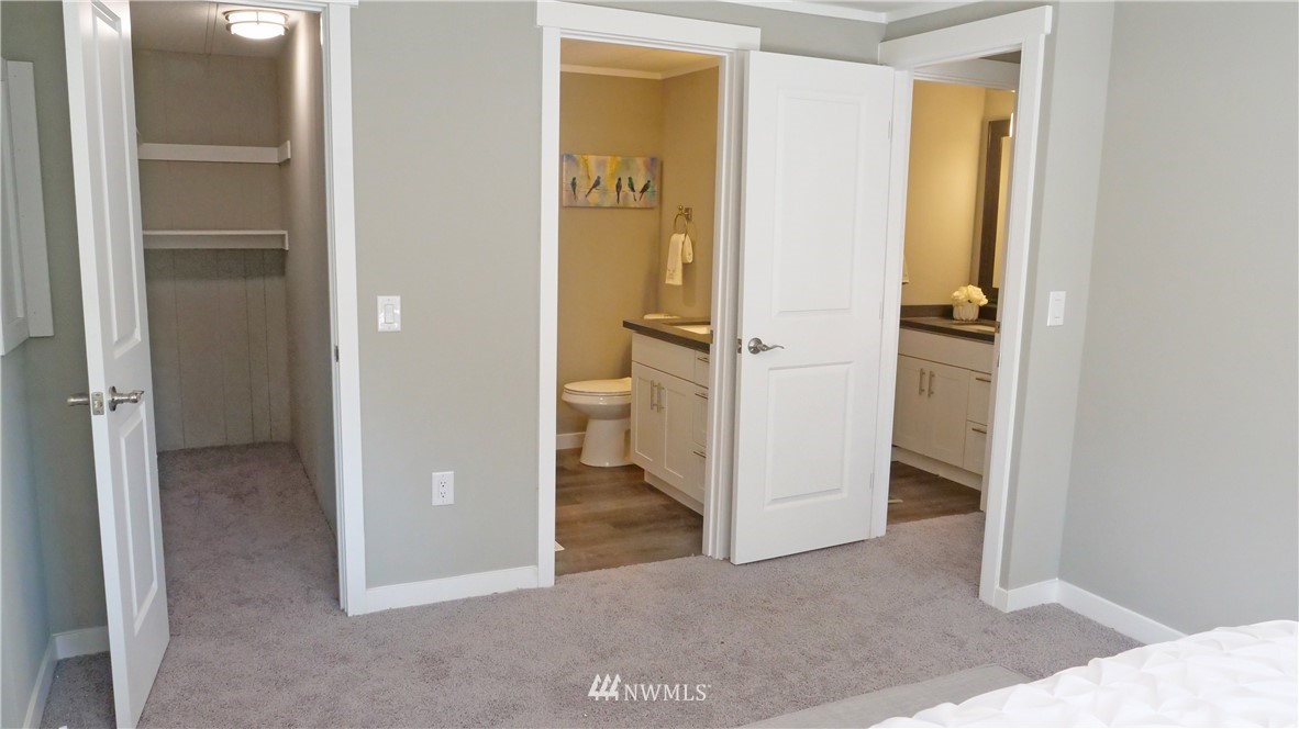 1128 Lake View Circle Bothell, WA 98021 - Photo 15 of 25 an empty room and a bathroom