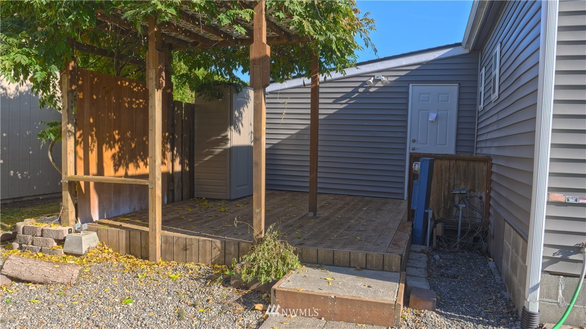 1128 Lake View Circle Bothell, WA 98021 - Photo 21 of 25 a house with trees in front of it