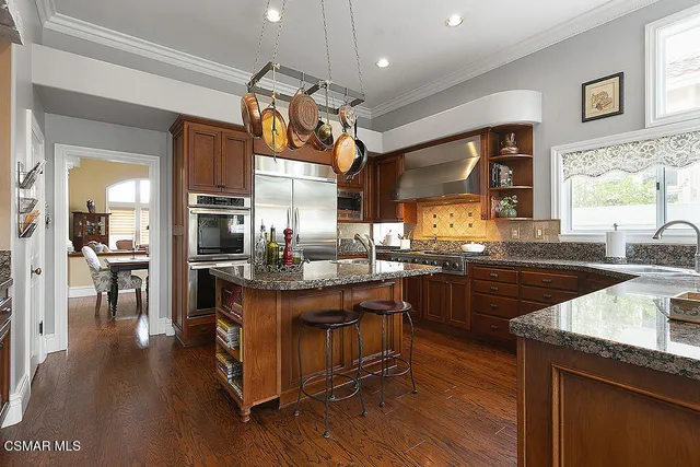 a living room with furniture fireplace and a flat screen tv