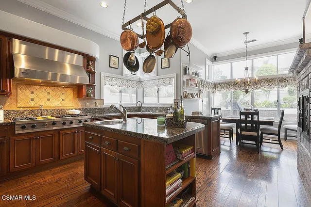 a living room with furniture or couch and a large window