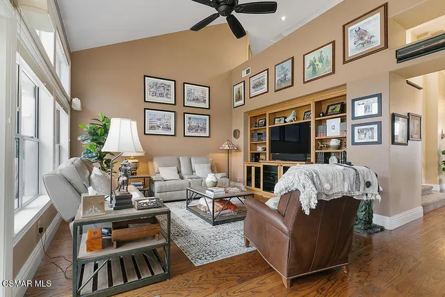 a bathroom with a granite countertop sink a mirror and