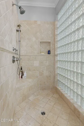 a kitchen with granite countertop a sink and cabinets