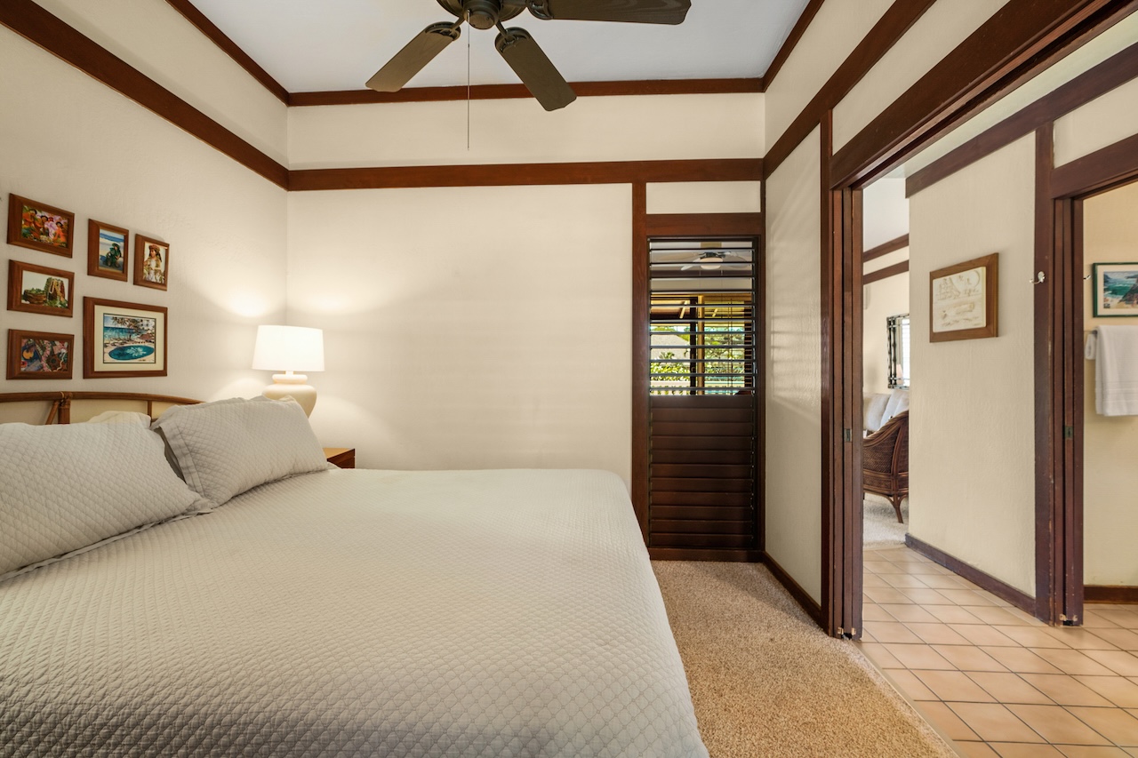 2253 Poipu Road, Unit 62 Koloa, HI 96756 - Photo 14 of 19 a bedroom with a bed and a window