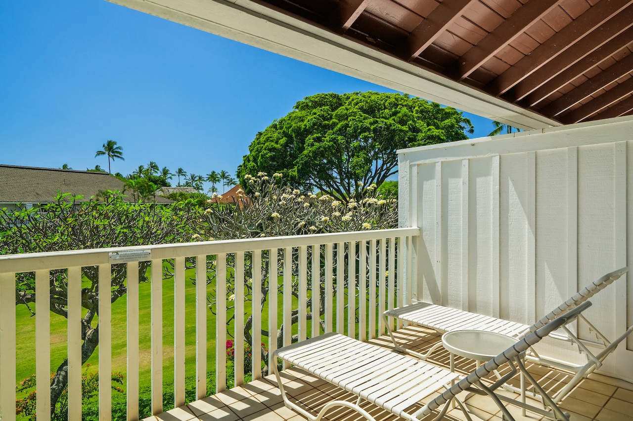 2253 Poipu Road, Unit 62 Koloa, HI 96756 - Photo 6 of 19 a balcony with wooden floor