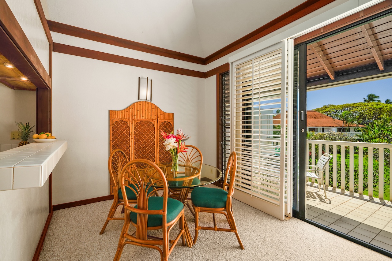 2253 Poipu Road, Unit 62 Koloa, HI 96756 - Photo 7 of 19 a dining room with furniture and a window