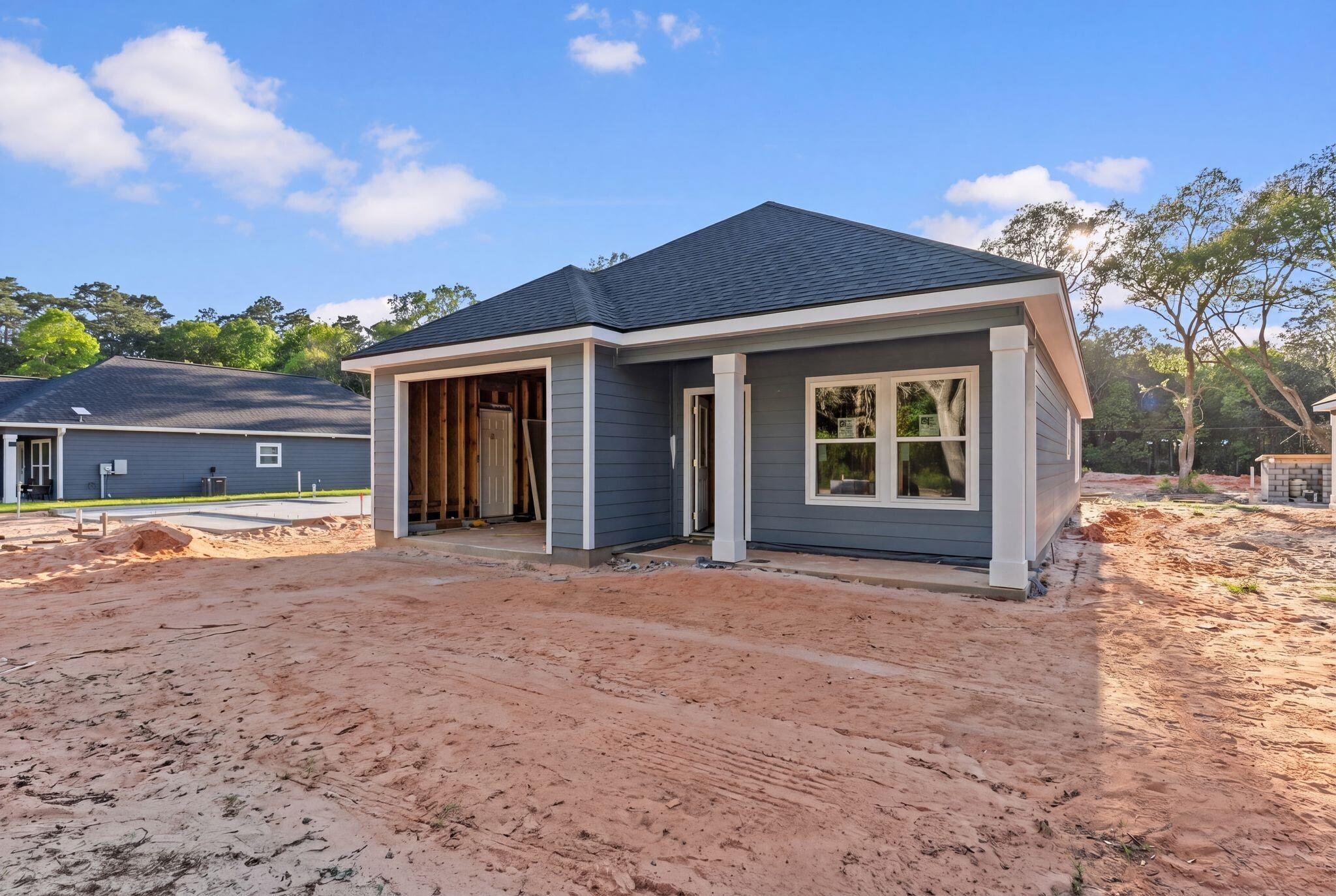 8657 Anniston Drive Elberta, AL 36530 - Photo 4 of 21 Back of house featuring a patio and a shingled roof