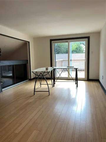 a view of a workspace with furniture