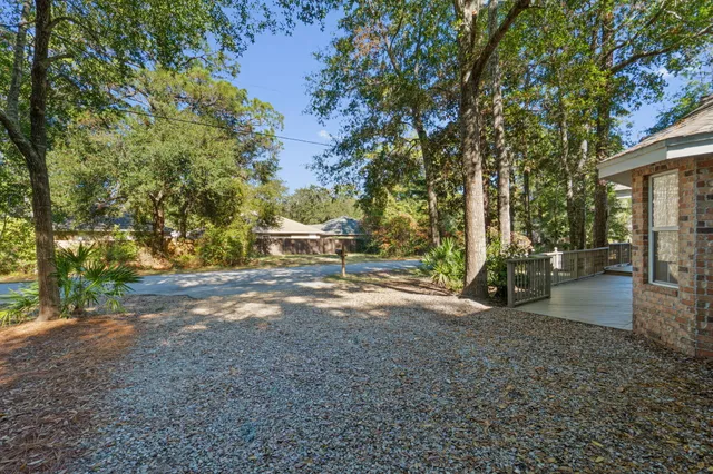 a view of a brick house with a glass door