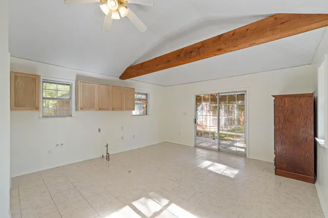 a view of a street with a building in the background