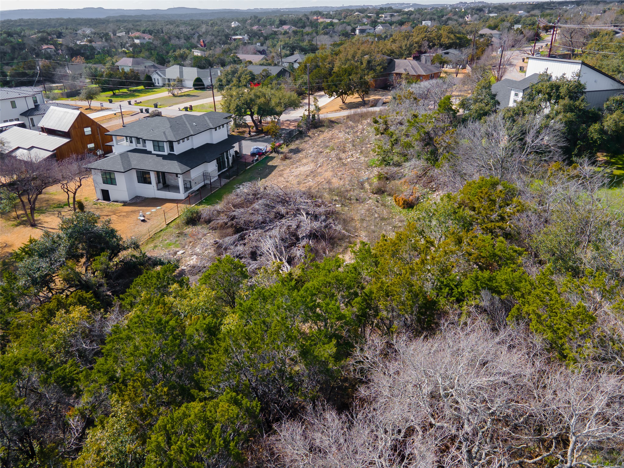 14432 Tuscola Circle Austin, TX 78734 - Photo 17 of 18 an aerial view of a house with a yard