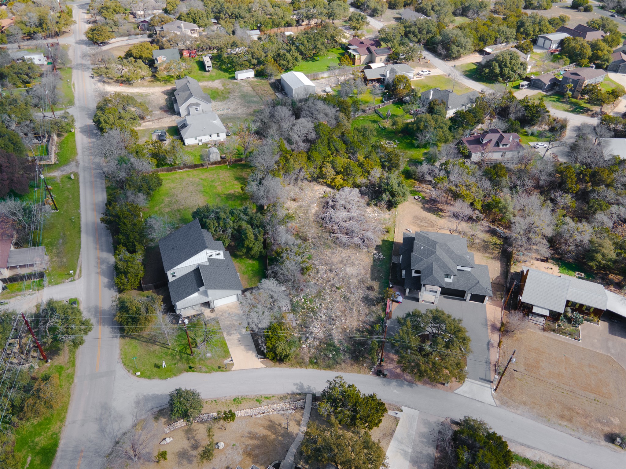 14432 Tuscola Circle Austin, TX 78734 - Photo 2 of 18 an aerial view of residential houses with outdoor space and trees