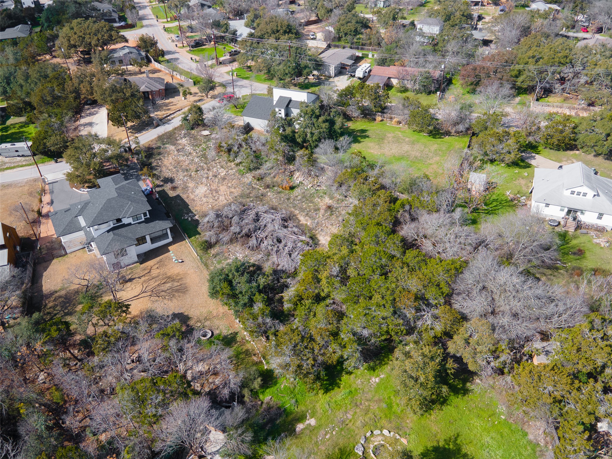 14432 Tuscola Circle Austin, TX 78734 - Photo 8 of 18 a aerial view of residential houses with outdoor space and trees