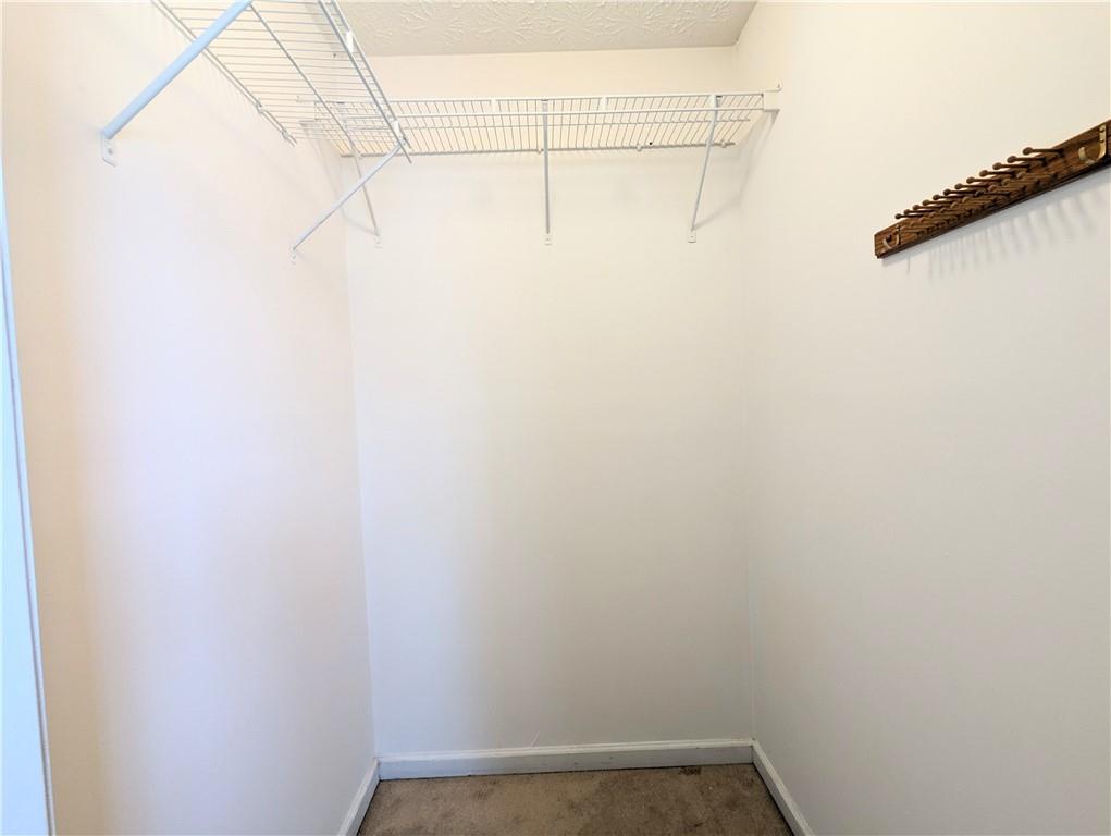 57 Inverness Trace Riverdale, GA 30274 - Photo 21 of 30 a view of a room with racks on the wall