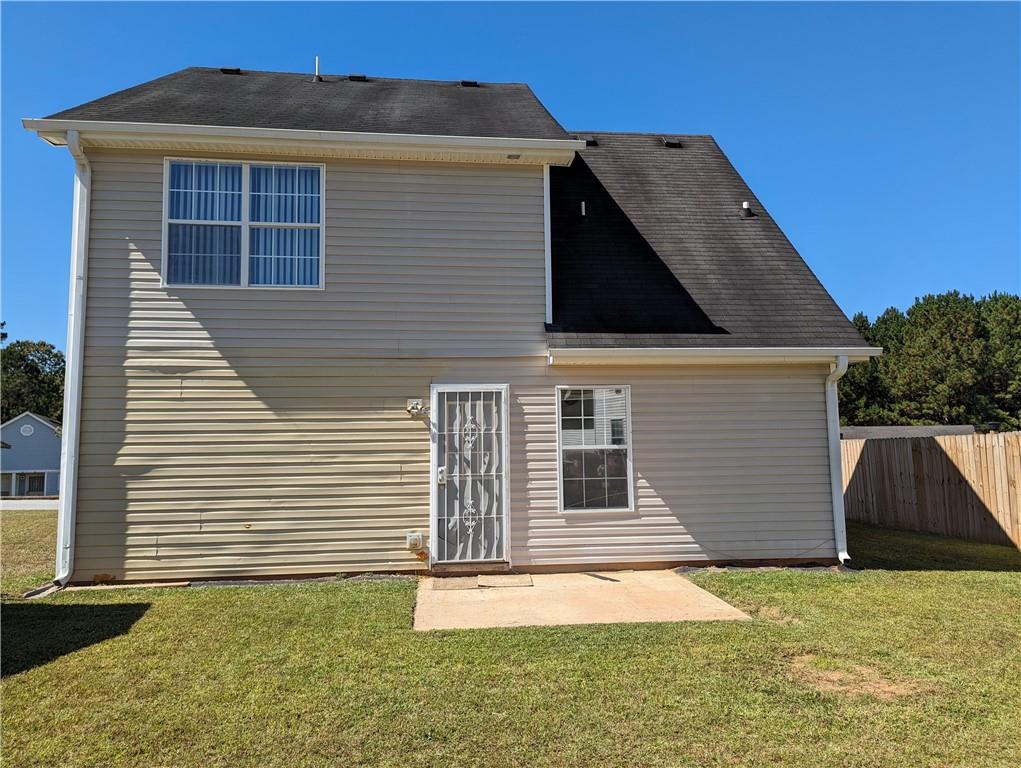 57 Inverness Trace Riverdale, GA 30274 - Photo 22 of 30 a backyard of a house
