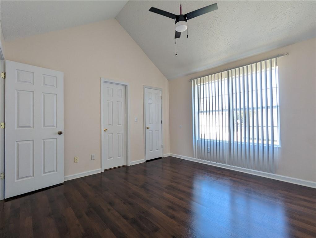 57 Inverness Trace Riverdale, GA 30274 - Photo 23 of 30 a view of an empty room with wooden floor and a window