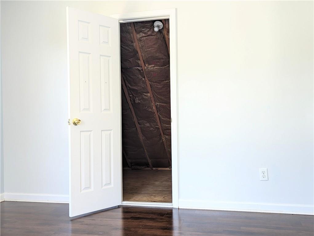 57 Inverness Trace Riverdale, GA 30274 - Photo 26 of 30 a view of hallway with wooden floor