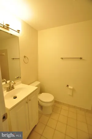 a view of deck with mountain view and wooden floor