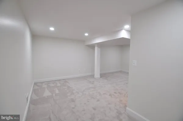 a view of backyard with tree