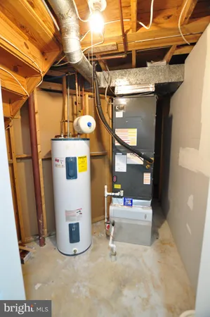 a view of a house with yard and sitting area