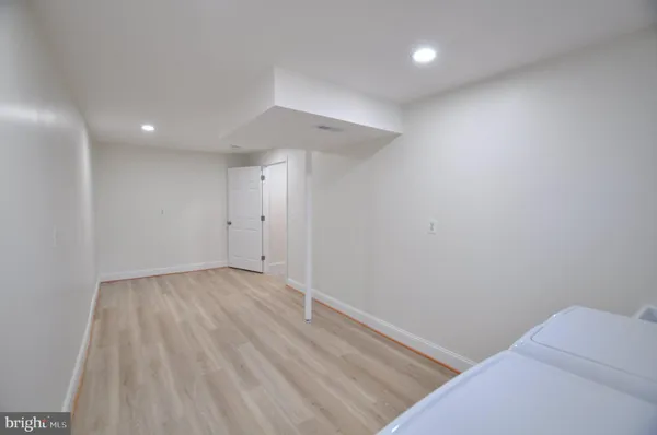 a front view of house with yard outdoor seating and barbeque oven