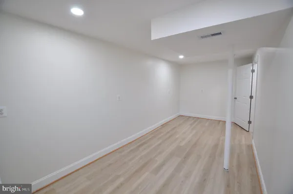 a front view of house with outdoor space and swimming pool