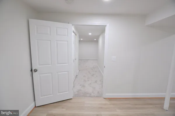 an aerial view of a house with garden space and sitting space