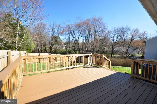 an aerial view of houses with outdoor space