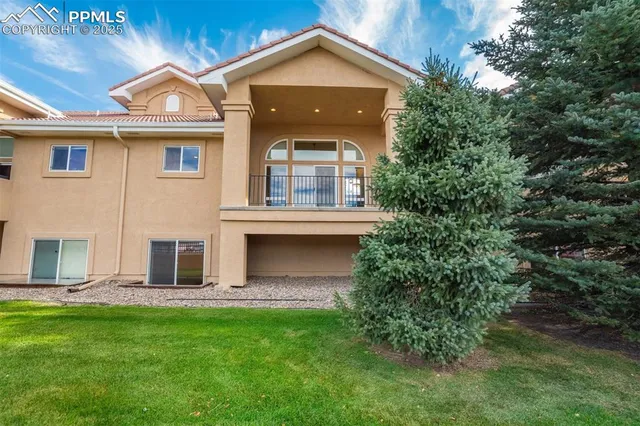 a view of a lake with a yard