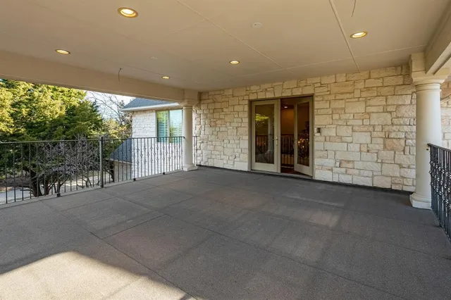 a view of a livingroom with a chair and table