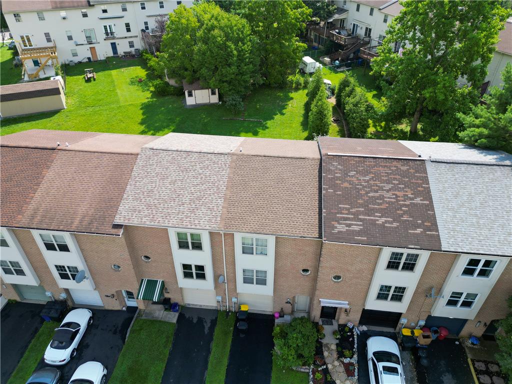 257 Ridgeview Drive Alburtis, PA 18011 - Photo 22 of 24 An aerial perspective reveals the well-maintained roofs and brick exteriors of this charming townhome community.