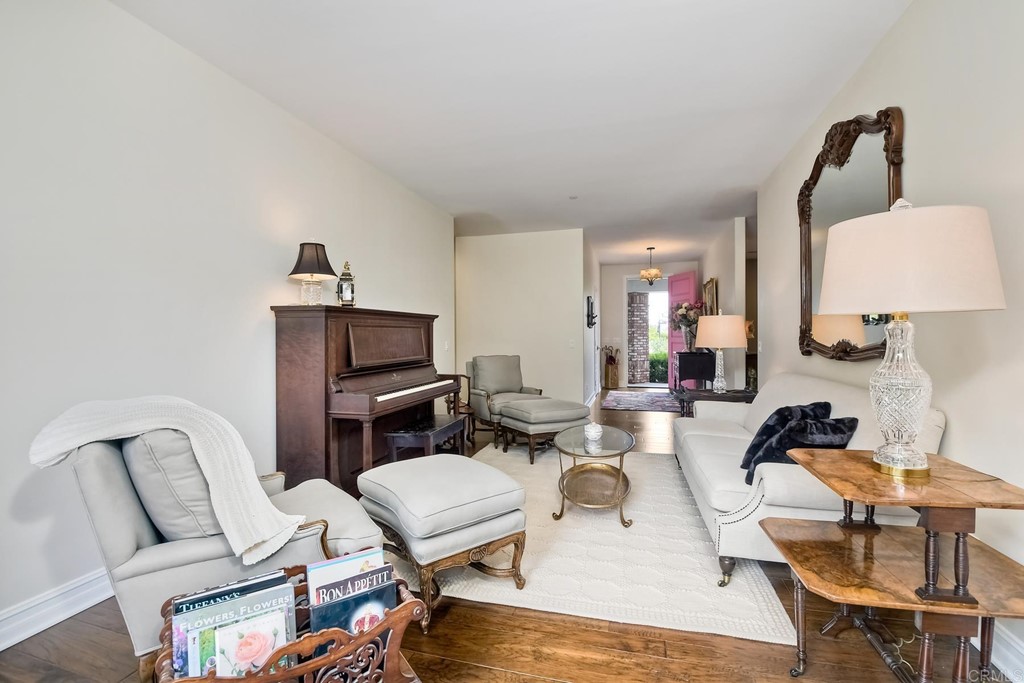 1494 Meredith Road Fallbrook, CA 92028 - Photo 14 of 47 a living room with furniture a flat screen tv and rug