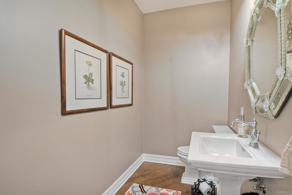 1494 Meredith Road Fallbrook, CA 92028 - Photo 15 of 47 a bathroom with a sink and a mirror