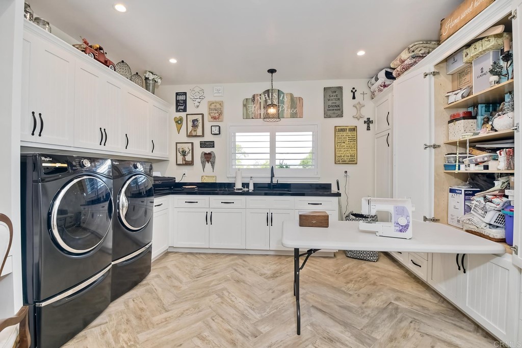 1494 Meredith Road Fallbrook, CA 92028 - Photo 16 of 47 a kitchen with stainless steel appliances granite countertop a sink and cabinets