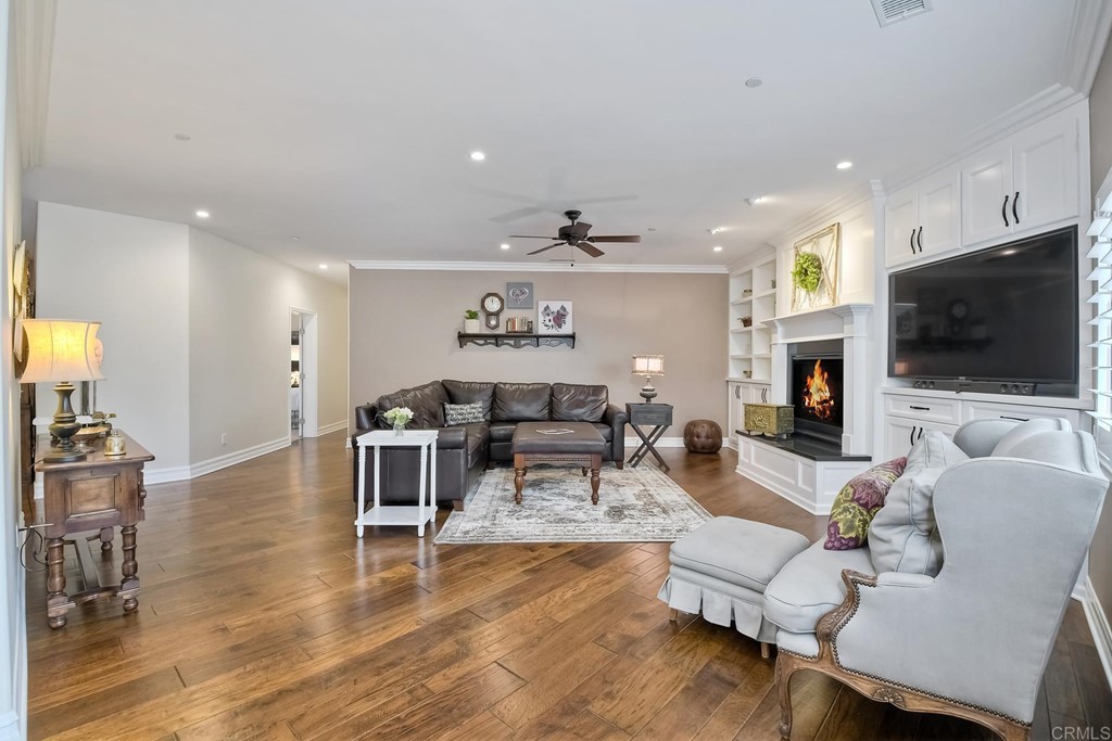 1494 Meredith Road Fallbrook, CA 92028 - Photo 28 of 47 a living room with furniture and a flat screen tv