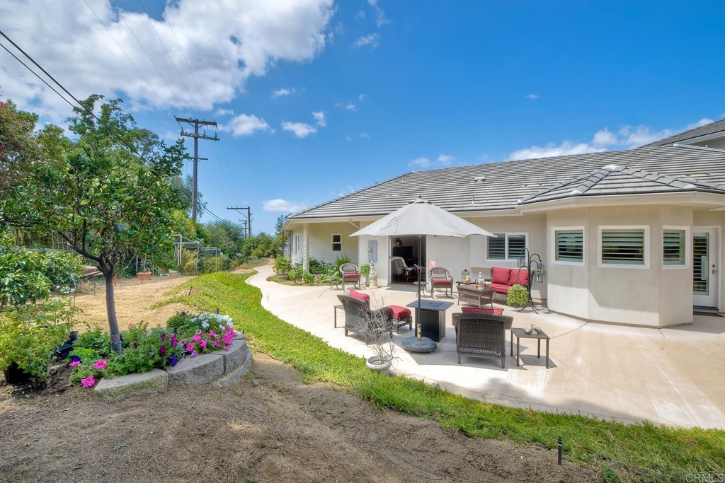 1494 Meredith Road Fallbrook, CA 92028 - Photo 44 of 47 a view of a house with sitting area and garden