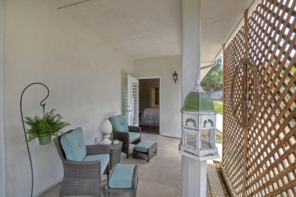 1494 Meredith Road Fallbrook, CA 92028 - Photo 45 of 47 a living room with furniture and a potted plant