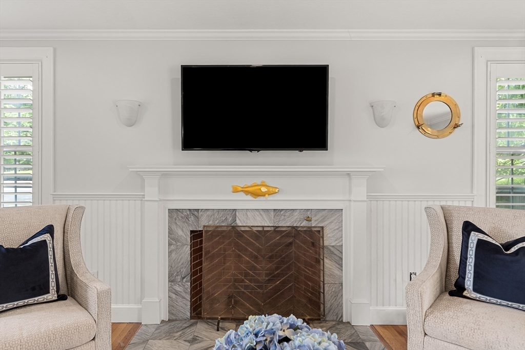 6 Shetland Road Marblehead, MA 01945 - Photo 5 of 39 a living room with furniture and a fireplace