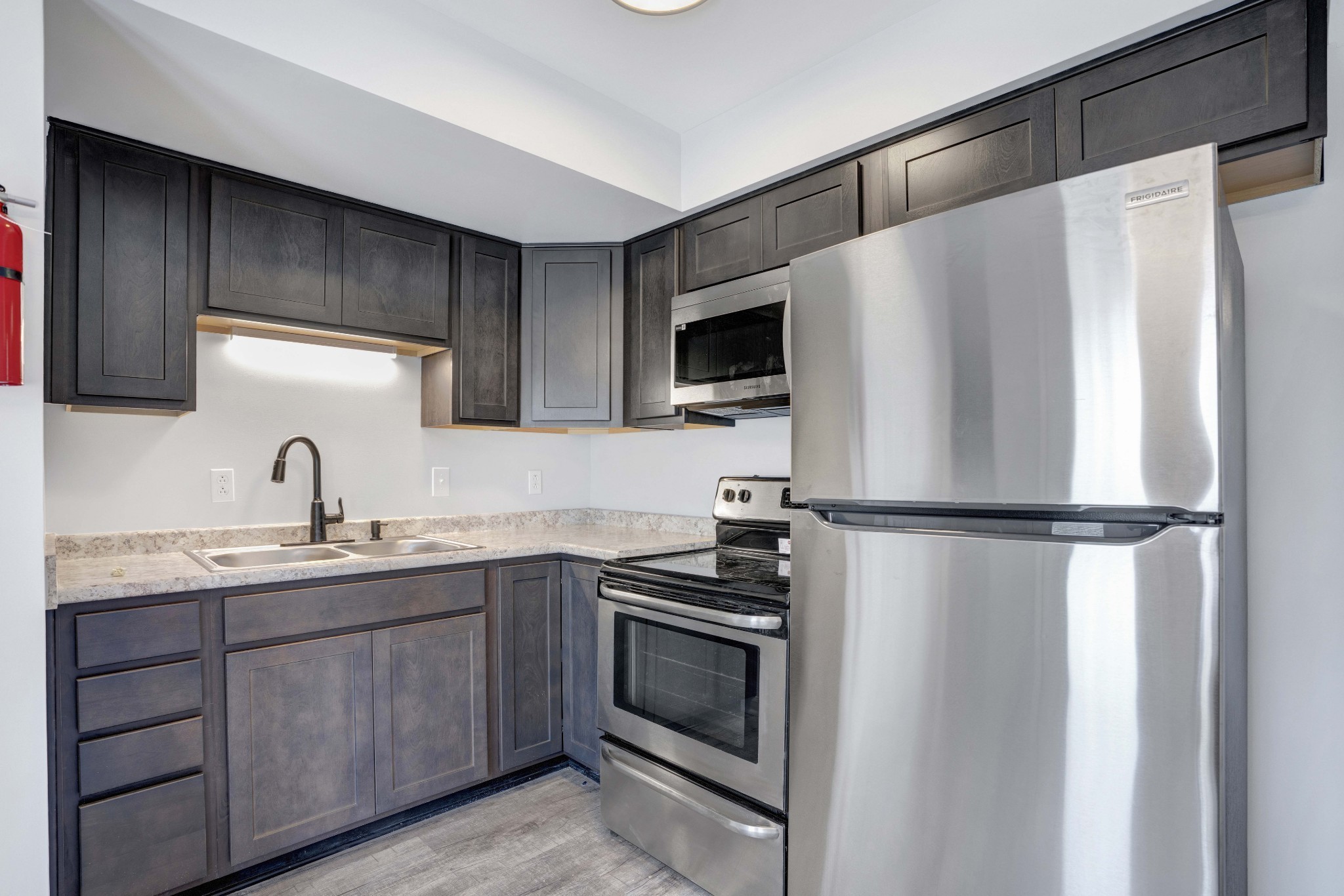 1108 Pembroke Oak Grove Road, Unit 19 Oak Grove, KY 42262 - Photo 11 of 18 a kitchen with a refrigerator sink and stove