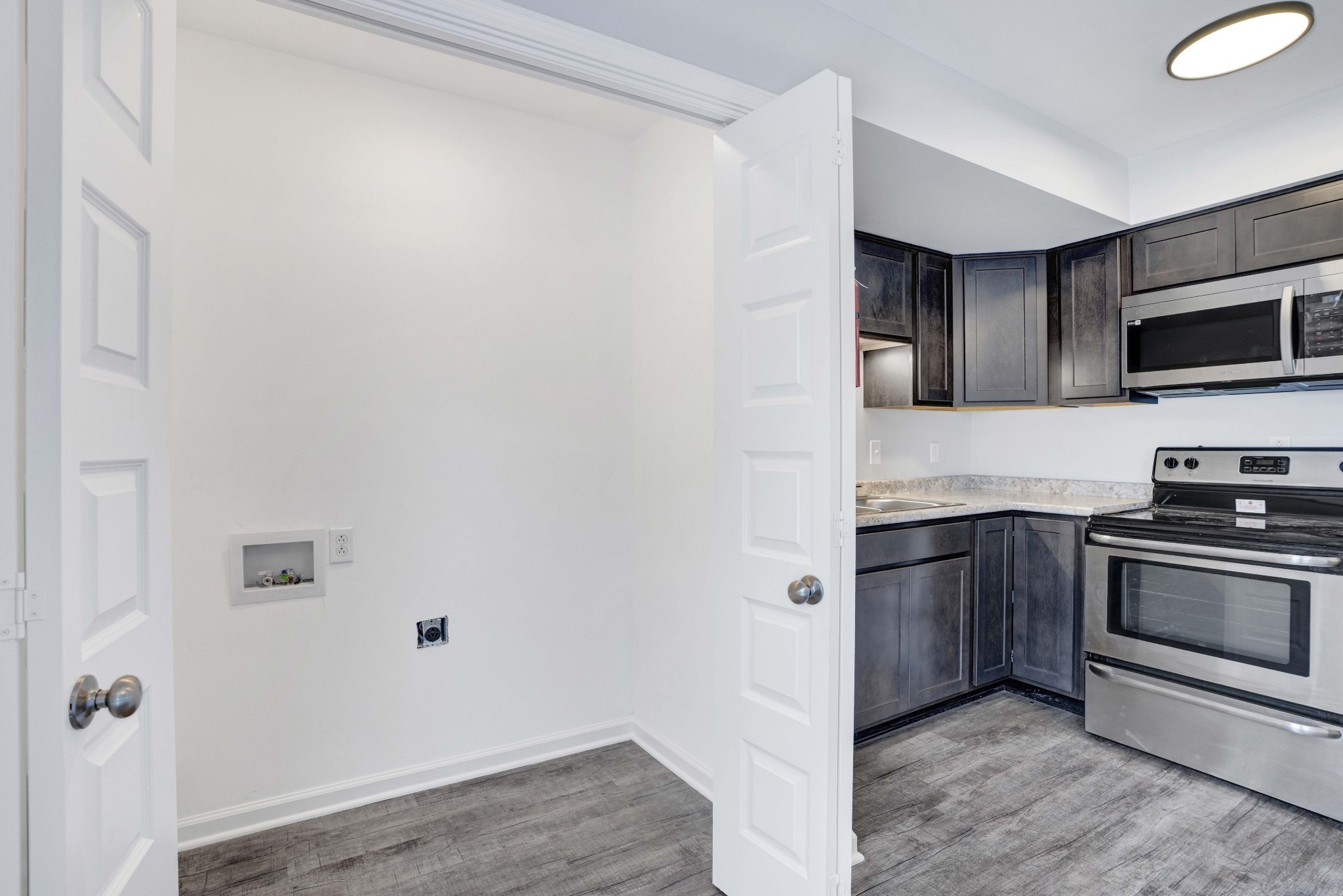 1108 Pembroke Oak Grove Road, Unit 19 Oak Grove, KY 42262 - Photo 12 of 18 a kitchen with a sink and steel appliances