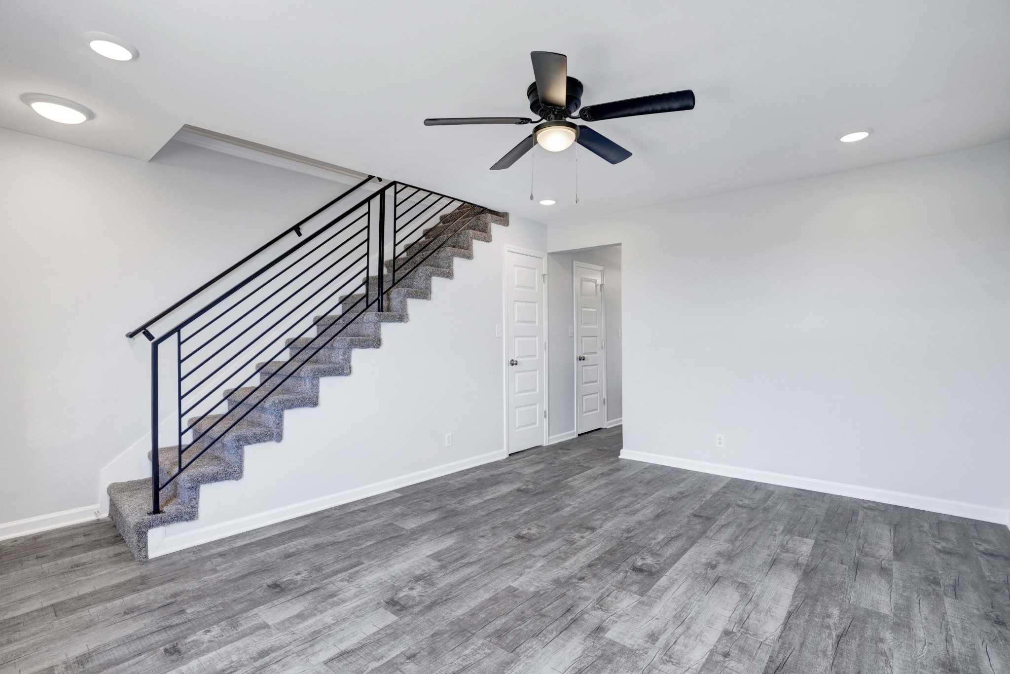 1108 Pembroke Oak Grove Road, Unit 19 Oak Grove, KY 42262 - Photo 3 of 18 a view of a hallway with wooden floor and stairs