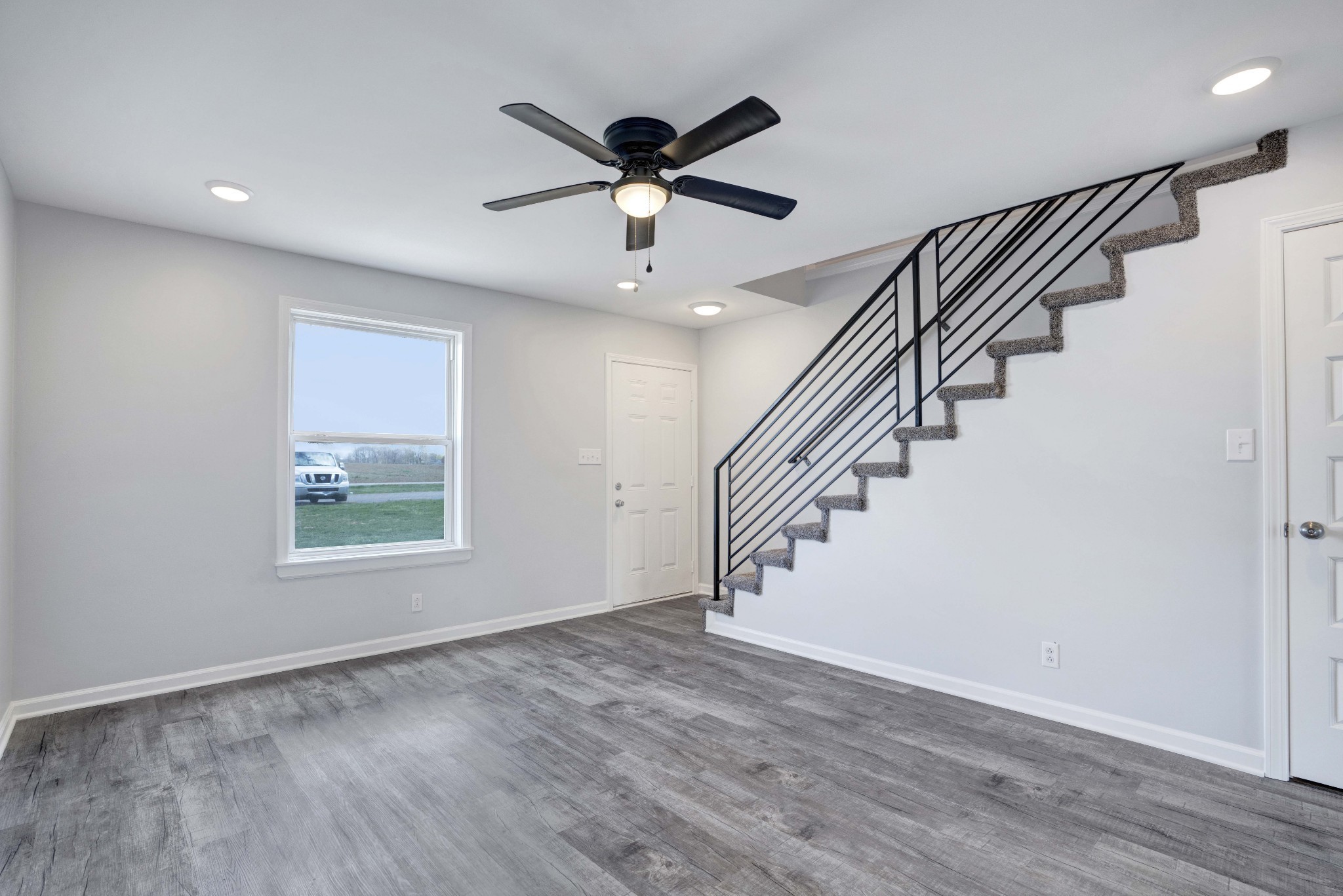 1108 Pembroke Oak Grove Road, Unit 19 Oak Grove, KY 42262 - Photo 5 of 18 a view of an entryway with wooden floor and a ceiling fan