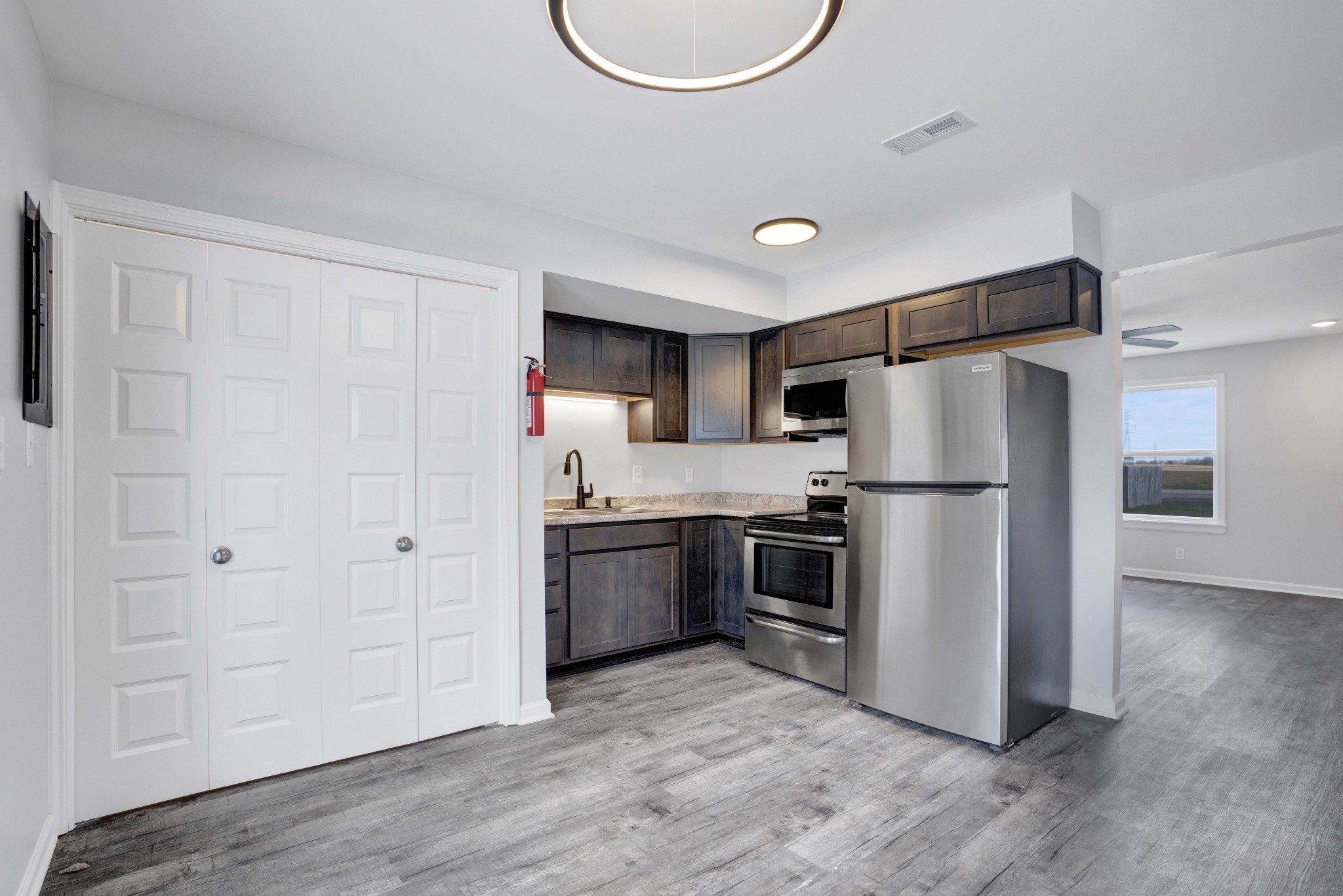 1108 Pembroke Oak Grove Road, Unit 19 Oak Grove, KY 42262 - Photo 7 of 18 a kitchen with stainless steel appliances a refrigerator and a stove top oven