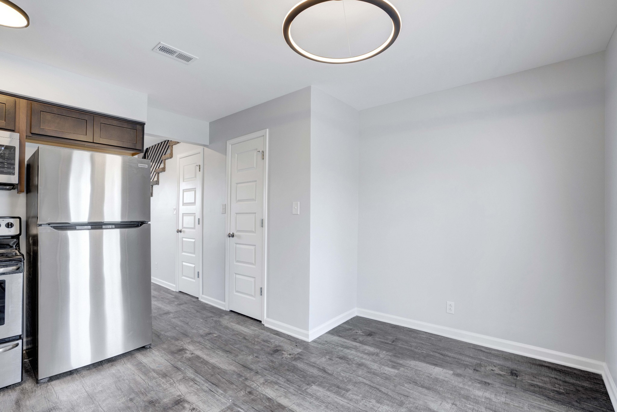 1108 Pembroke Oak Grove Road, Unit 19 Oak Grove, KY 42262 - Photo 8 of 18 a view of a kitchen with a refrigerator and wooden floor
