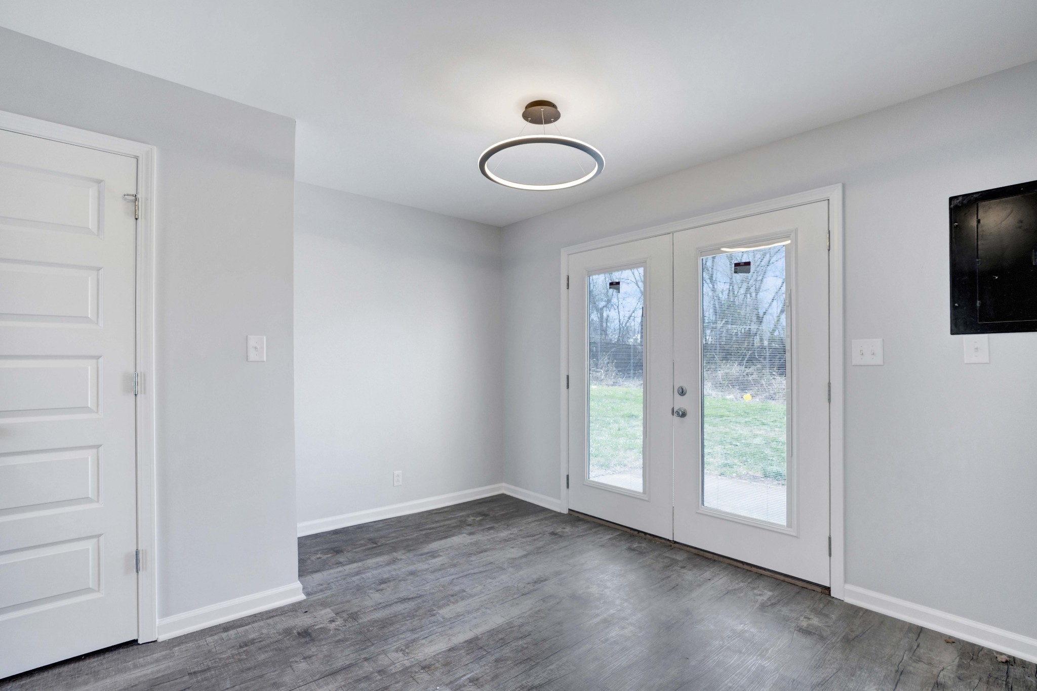 1108 Pembroke Oak Grove Road, Unit 19 Oak Grove, KY 42262 - Photo 9 of 18 an empty room with wooden floor and windows