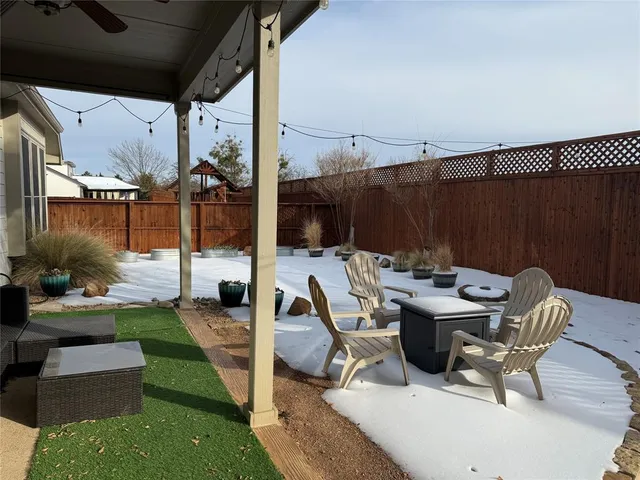 a view of a patio filled with furniture