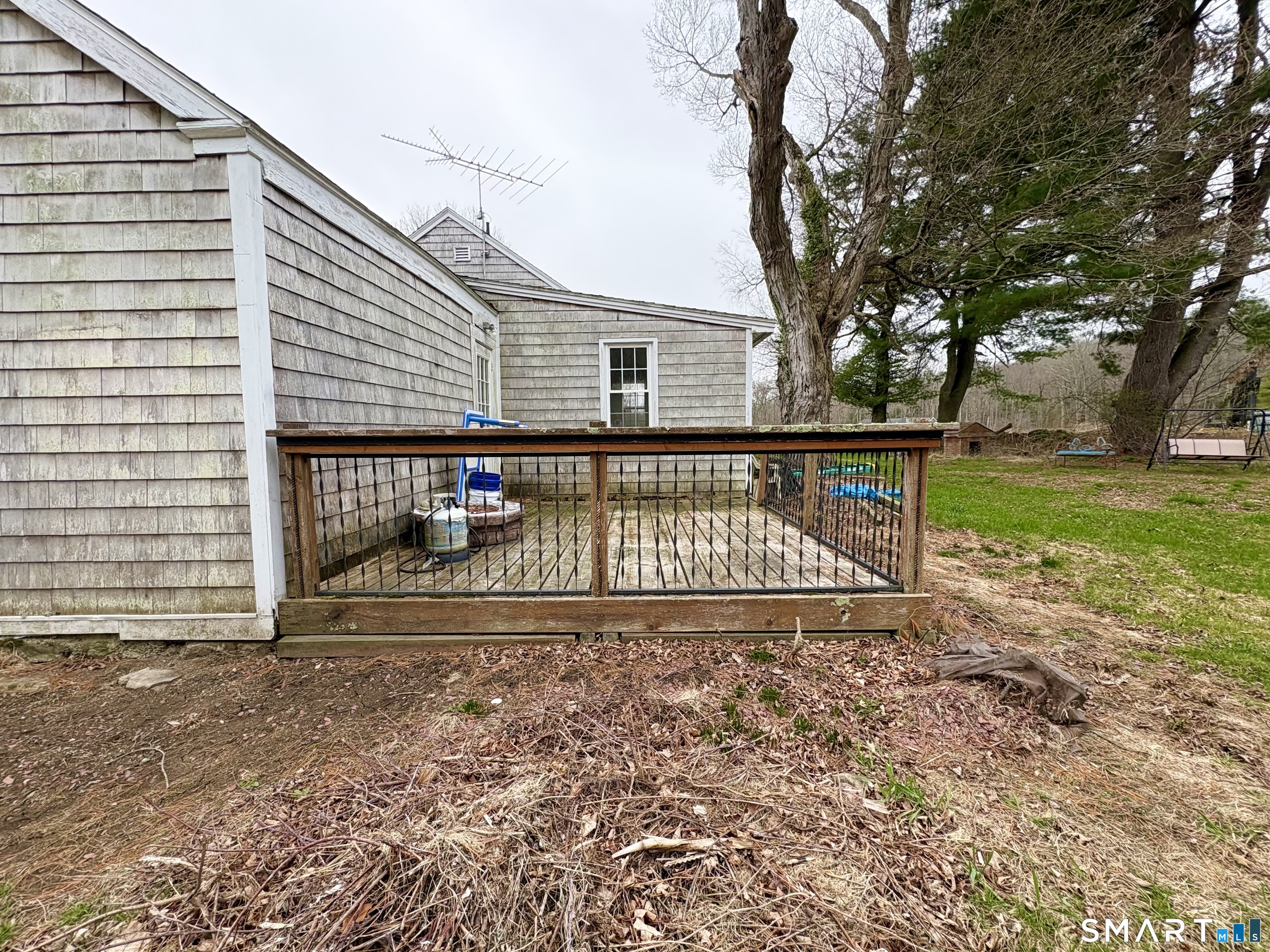 279 River Road Putnam, CT 06260 - Photo 5 of 18 a view of a house with a yard next to a road