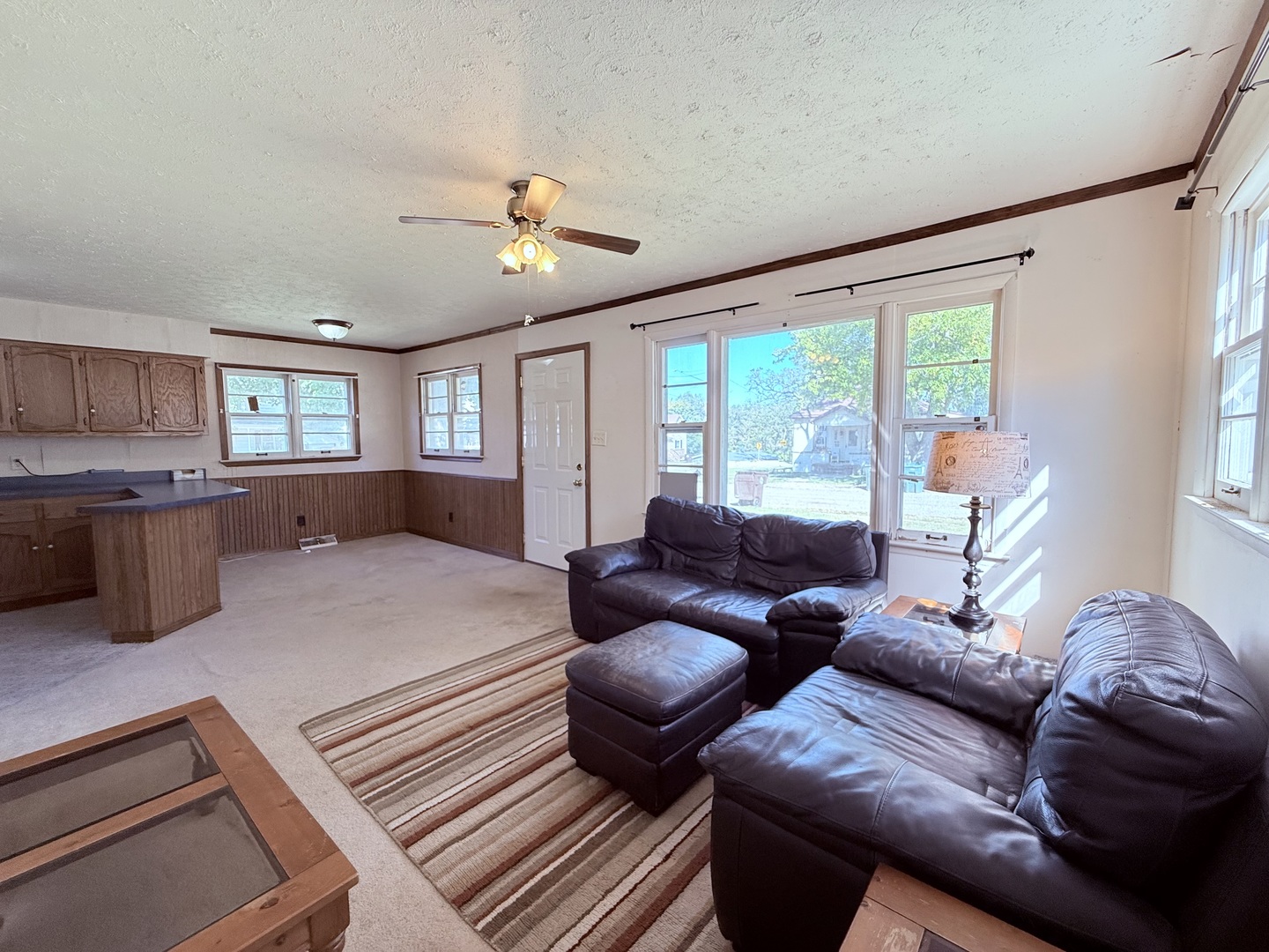 120 West Cherry Street Clinton, IL 61727 - Photo 11 of 15 a living room with furniture and a large window