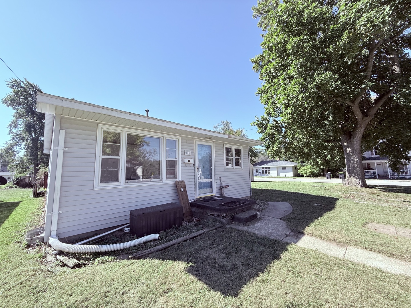 120 West Cherry Street Clinton, IL 61727 - Photo 14 of 15 a view of a house with a yard