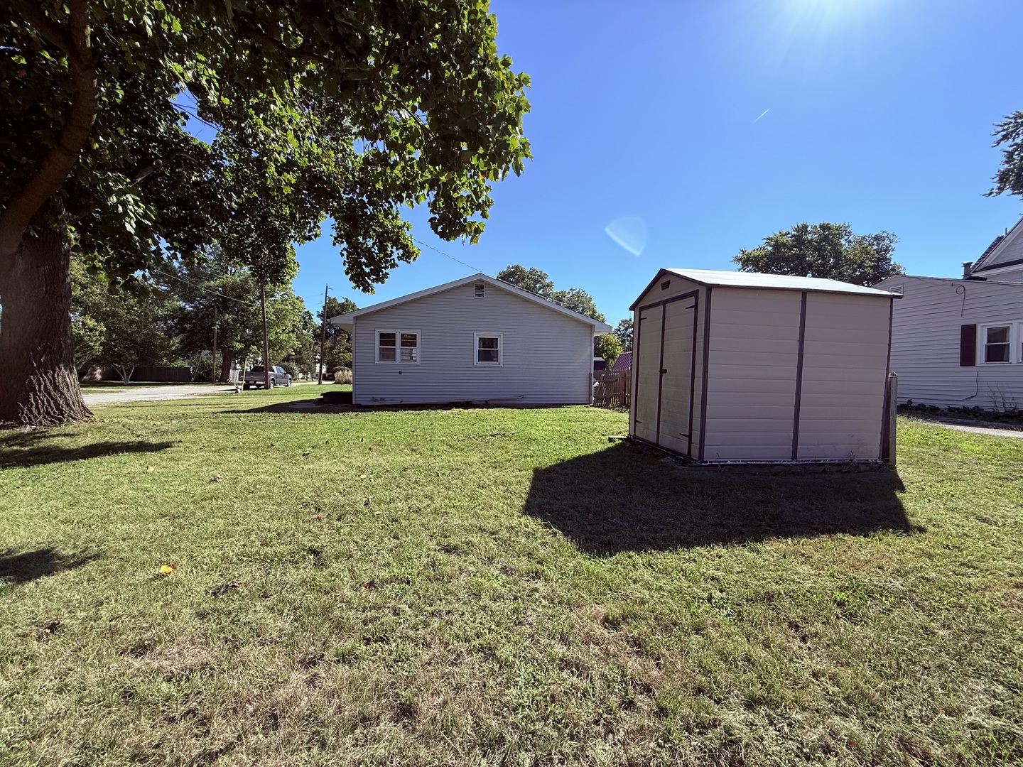 120 West Cherry Street Clinton, IL 61727 - Photo 2 of 15 a house view with a garden space