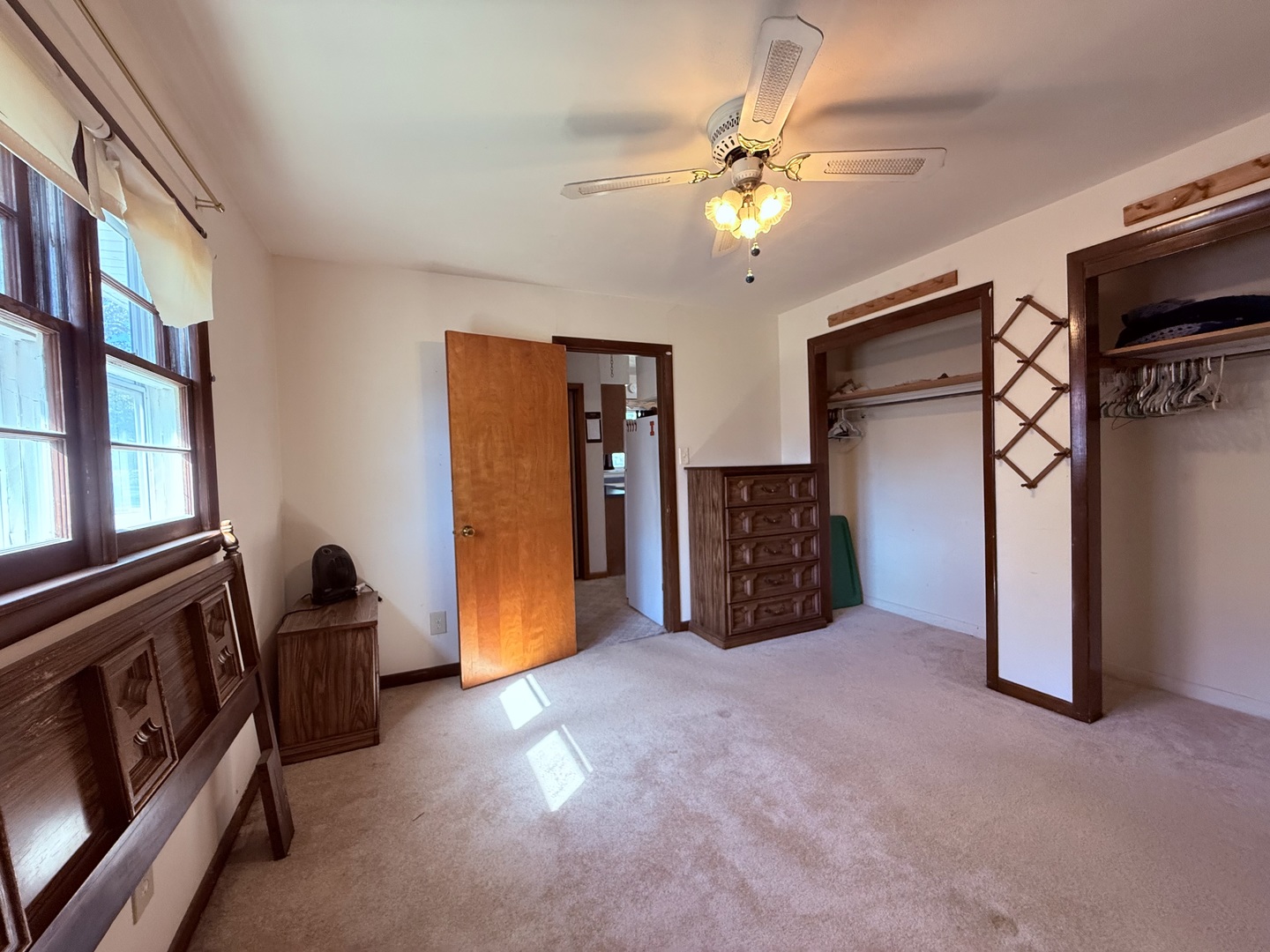 120 West Cherry Street Clinton, IL 61727 - Photo 4 of 15 a view of an empty room with a window